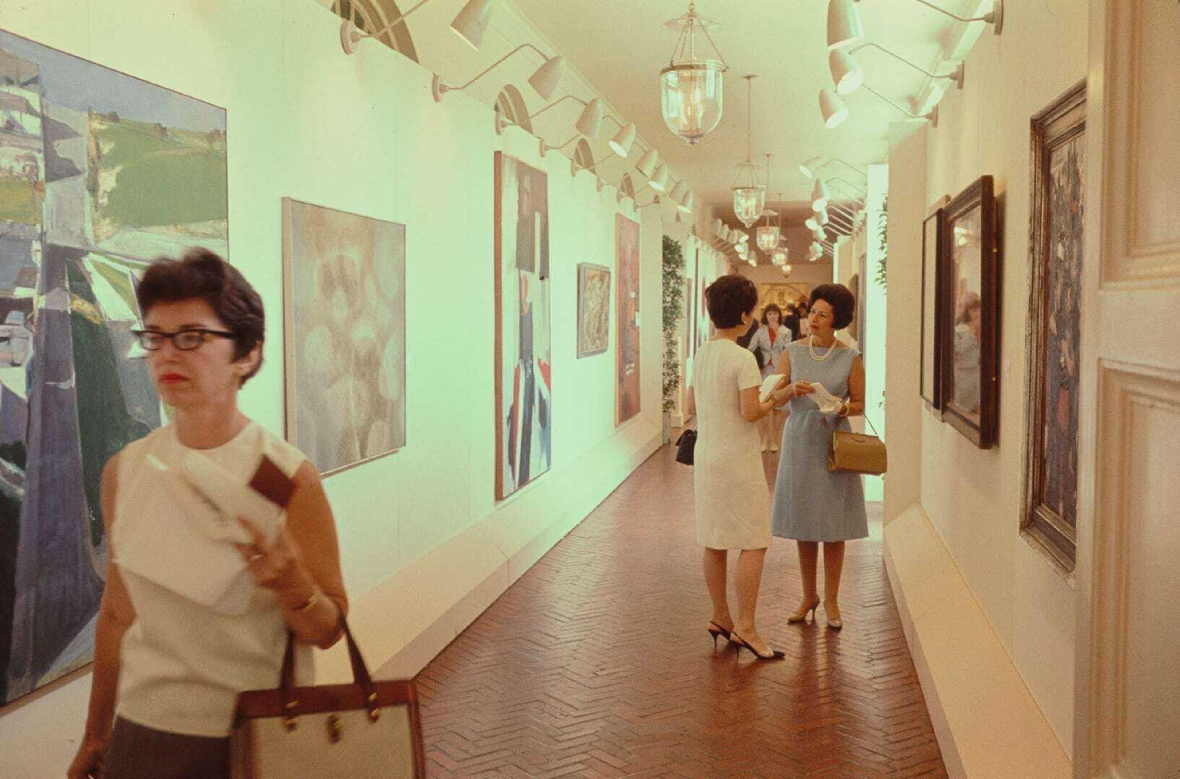 4363 mas 1965 lady bird johnson chatting in east colonnade during festival whha crop