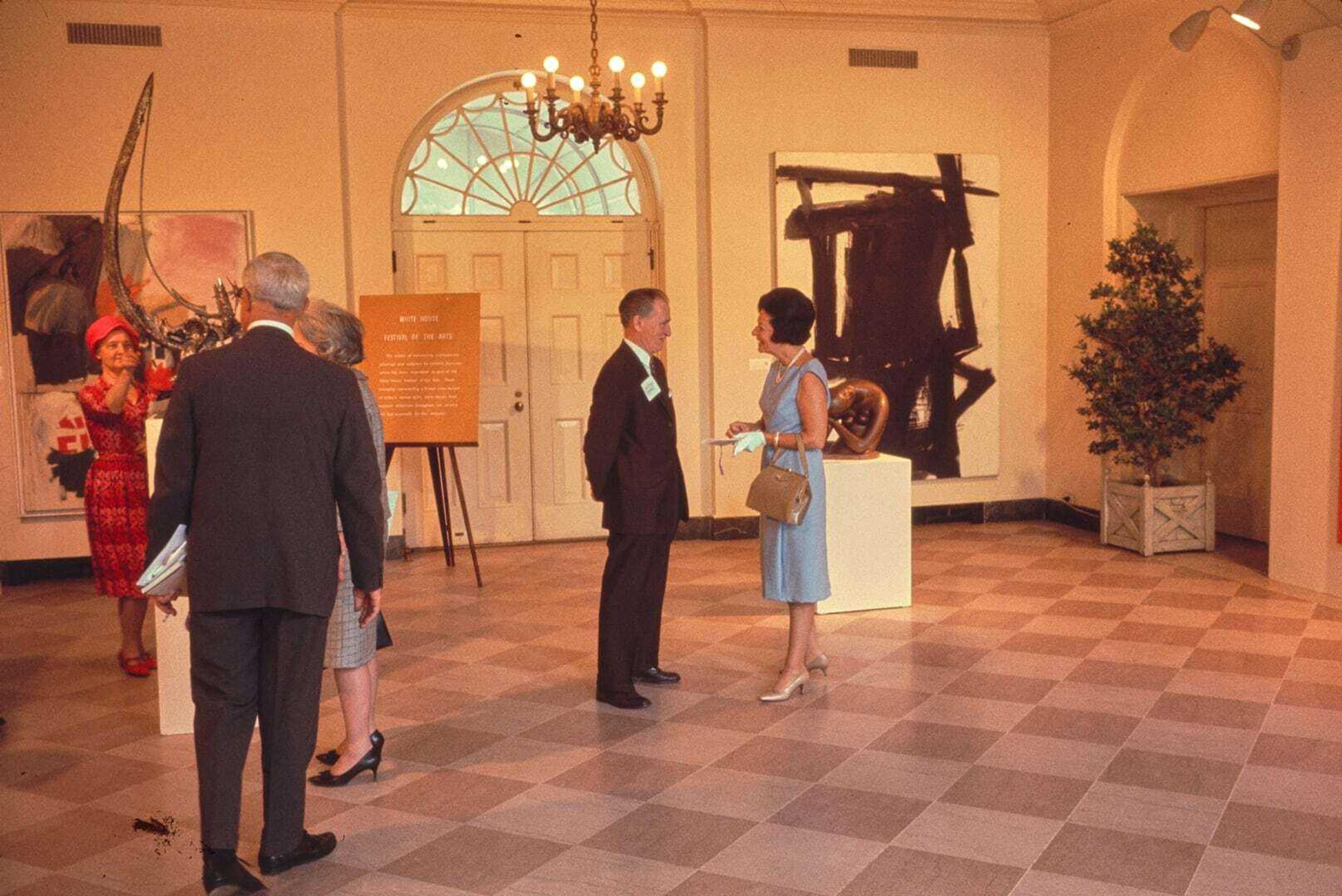 4366 mas 1965 lady bird johnson chatting with guest during festival whha crop